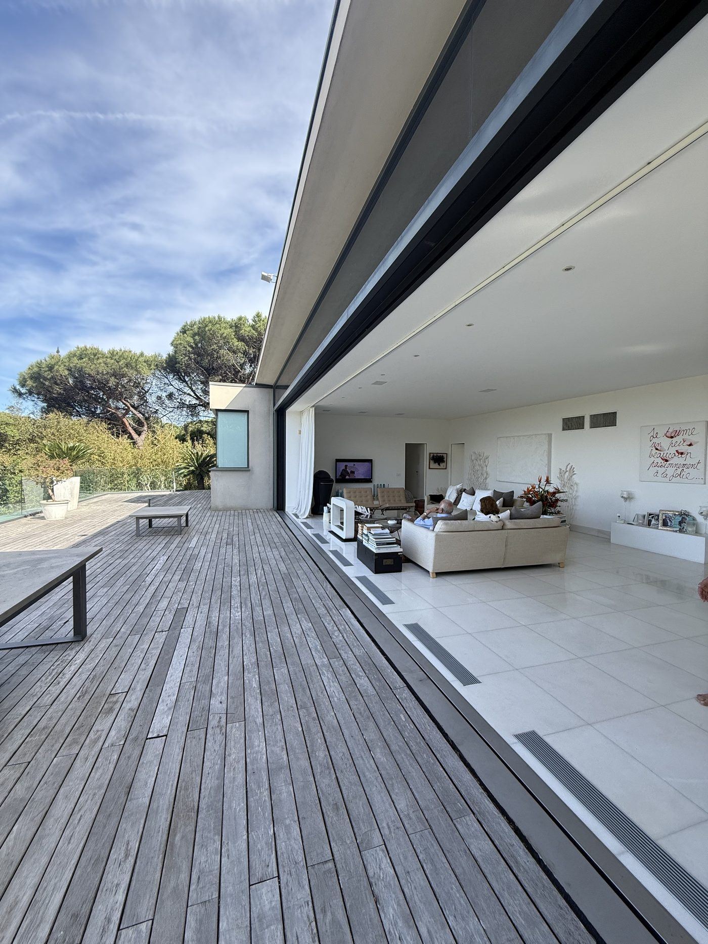 The deck with the salon glass wall fully open