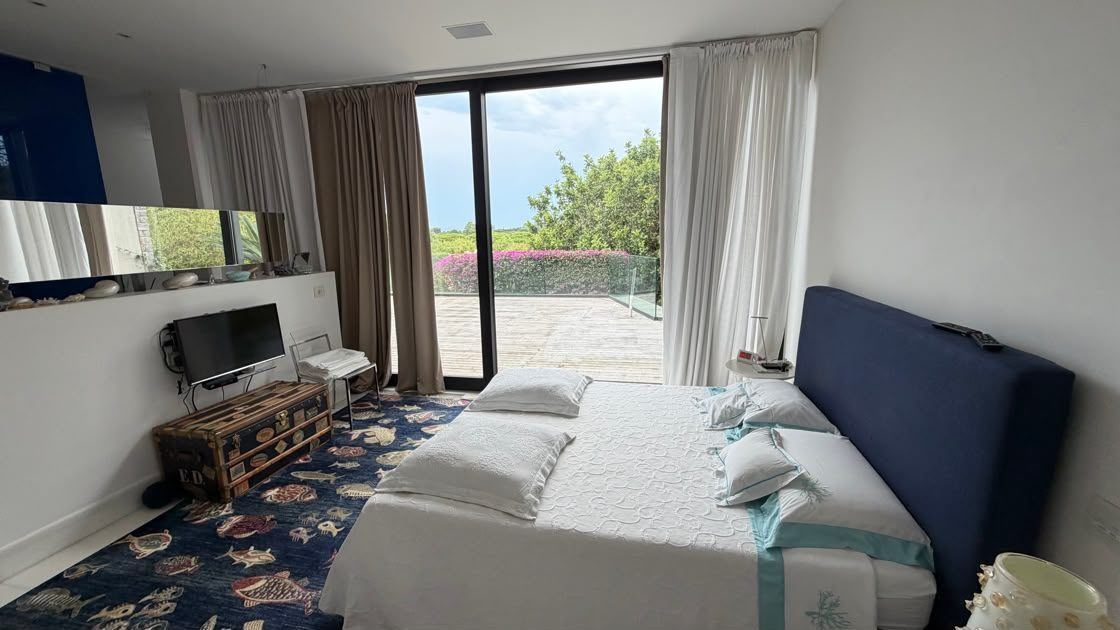 A bedroom opening to the garden